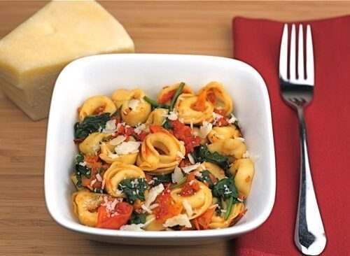 https://www.twopeasandtheirpod.com/wp-content/uploads/2010/06/cheese-tortellini-with-spinach-500x366.jpg