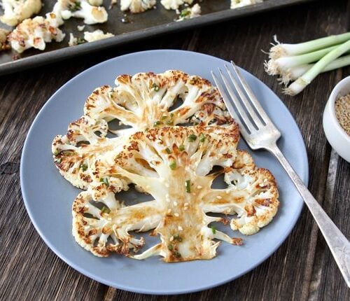 https://www.twopeasandtheirpod.com/wp-content/uploads/2013/02/Cauliflower-Steaks1-500x430.jpg