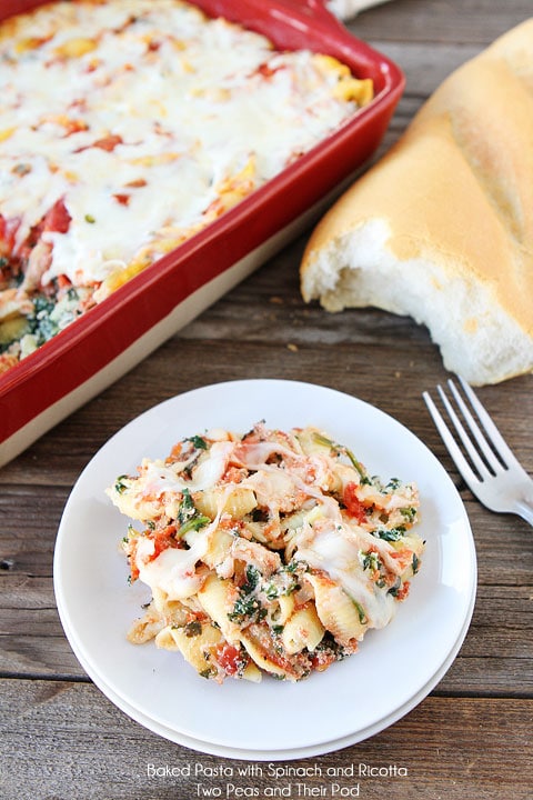 Baked spinach pasta shells served with french bread