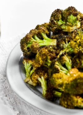 A bowl of roasted broccoli.