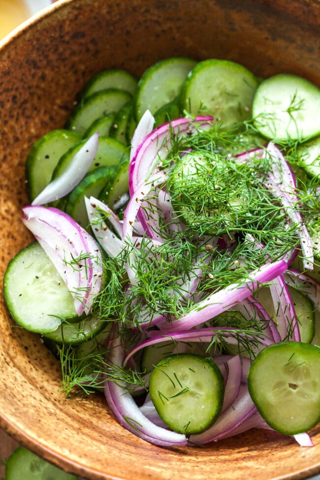 Cucumber salad in bowl 