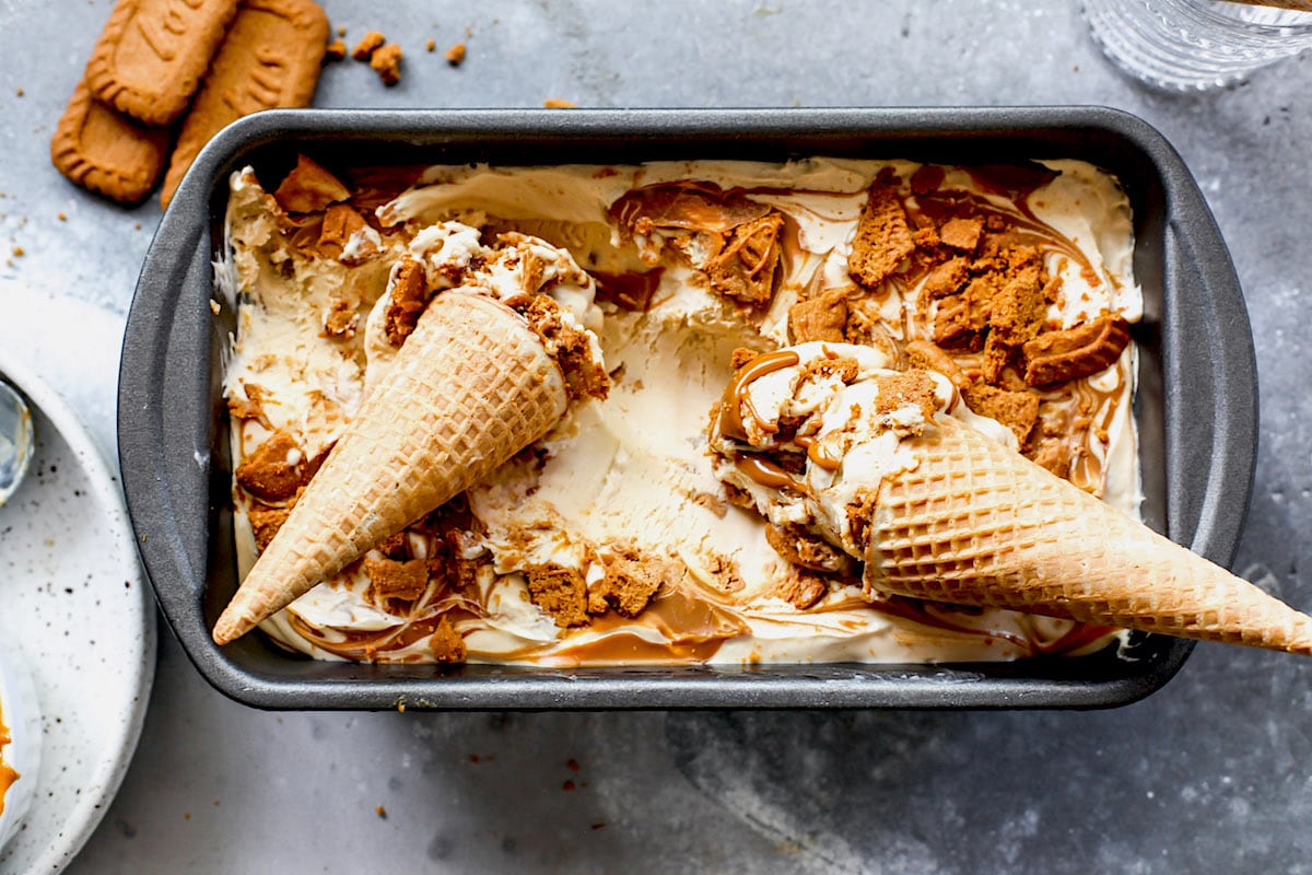 biscoff ice cream in pan with ice cream cones. 