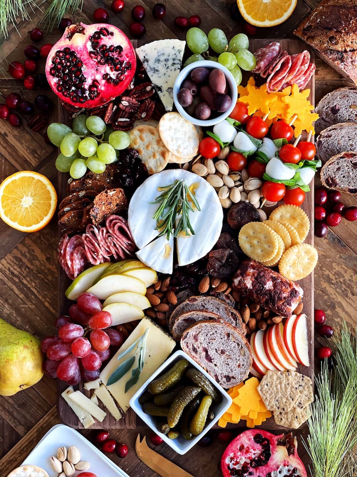 https://www.twopeasandtheirpod.com/wp-content/uploads/2020/11/Holiday-Cheese-Board-1.jpg
