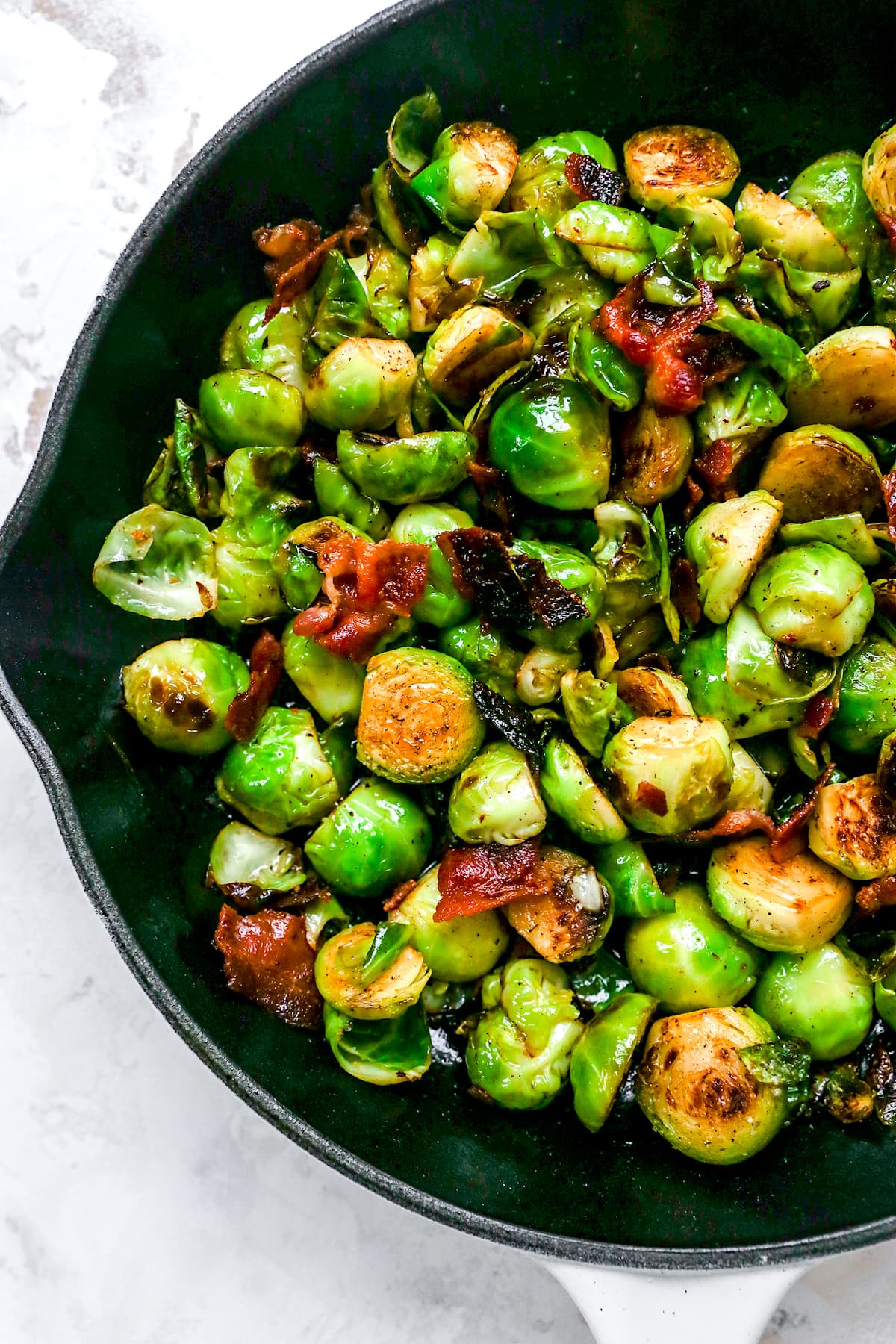 brussels sprouts with bacon in skillet.