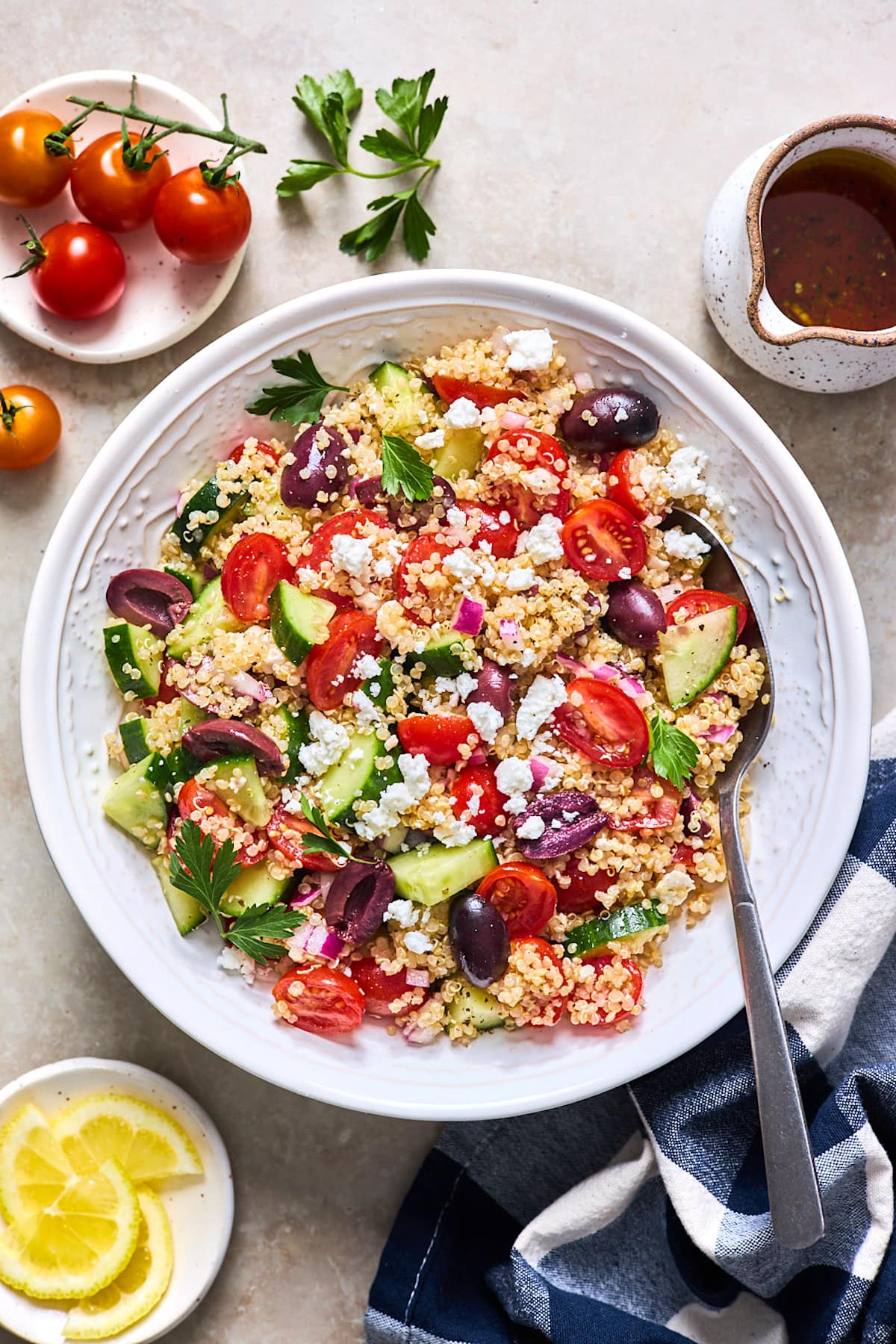 https://www.twopeasandtheirpod.com/wp-content/uploads/2021/06/Greek-Quinoa-Salad4637.jpg