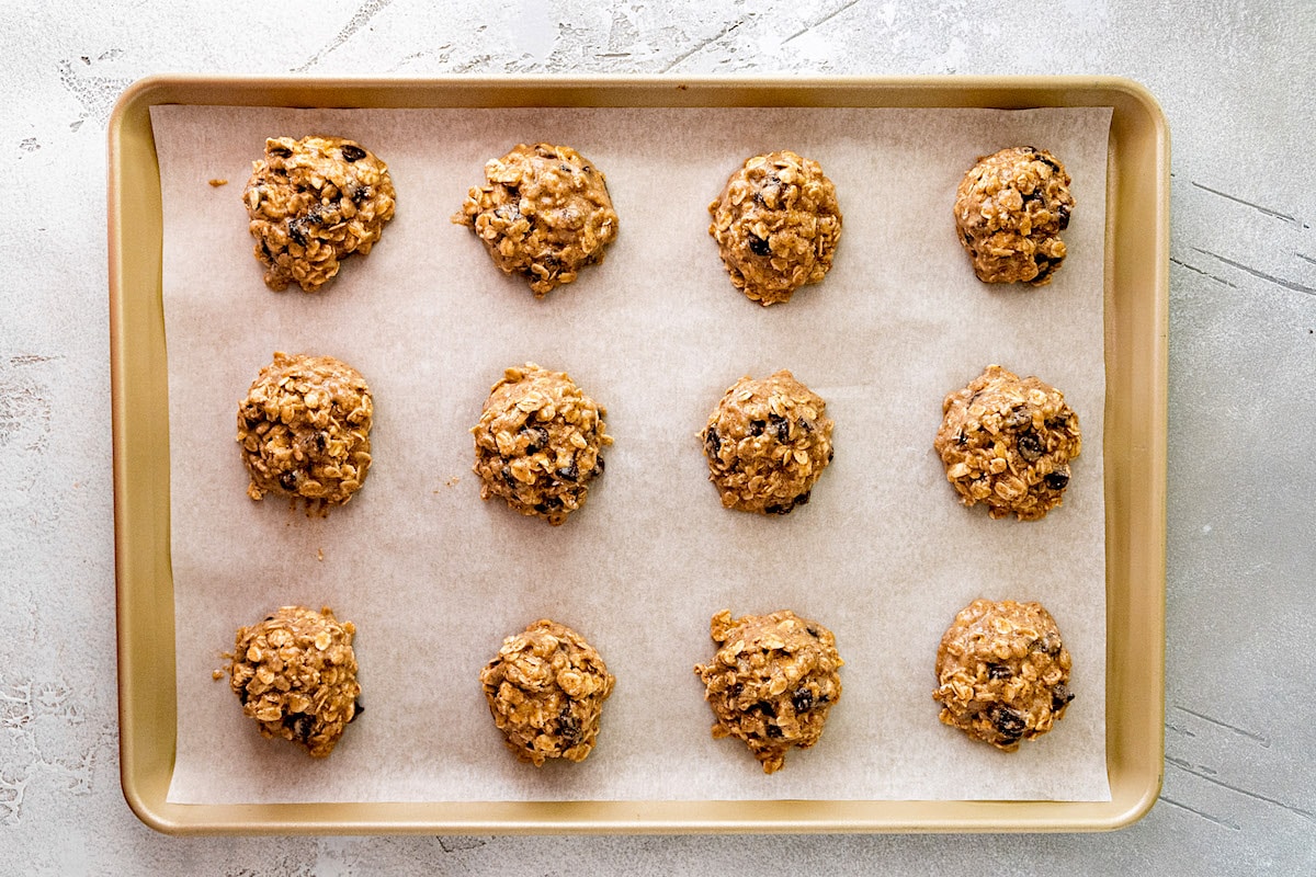 breakfast cookies on a baking sheet with parchment paper. 