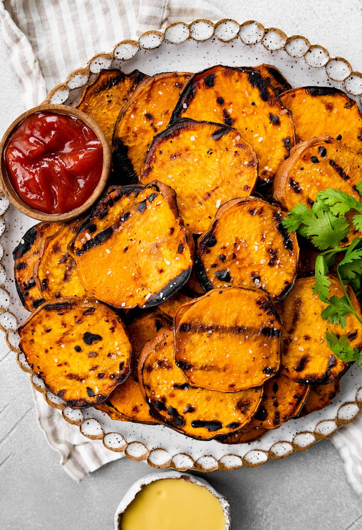 https://www.twopeasandtheirpod.com/wp-content/uploads/2022/06/Grilled-Sweet-Potatoes-9.jpg