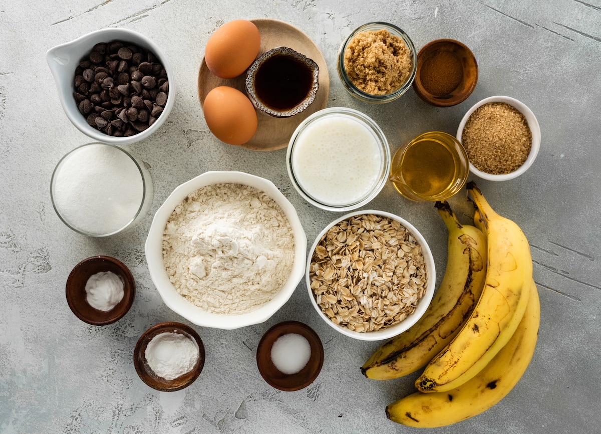 ingredients in bowls to make banana oatmeal muffins. 