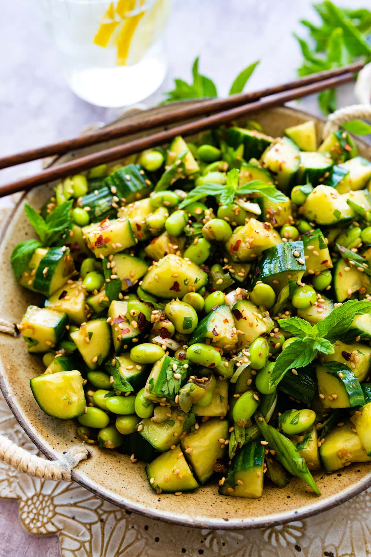 cucumber edamame salad with sesame seeds in bowl. 