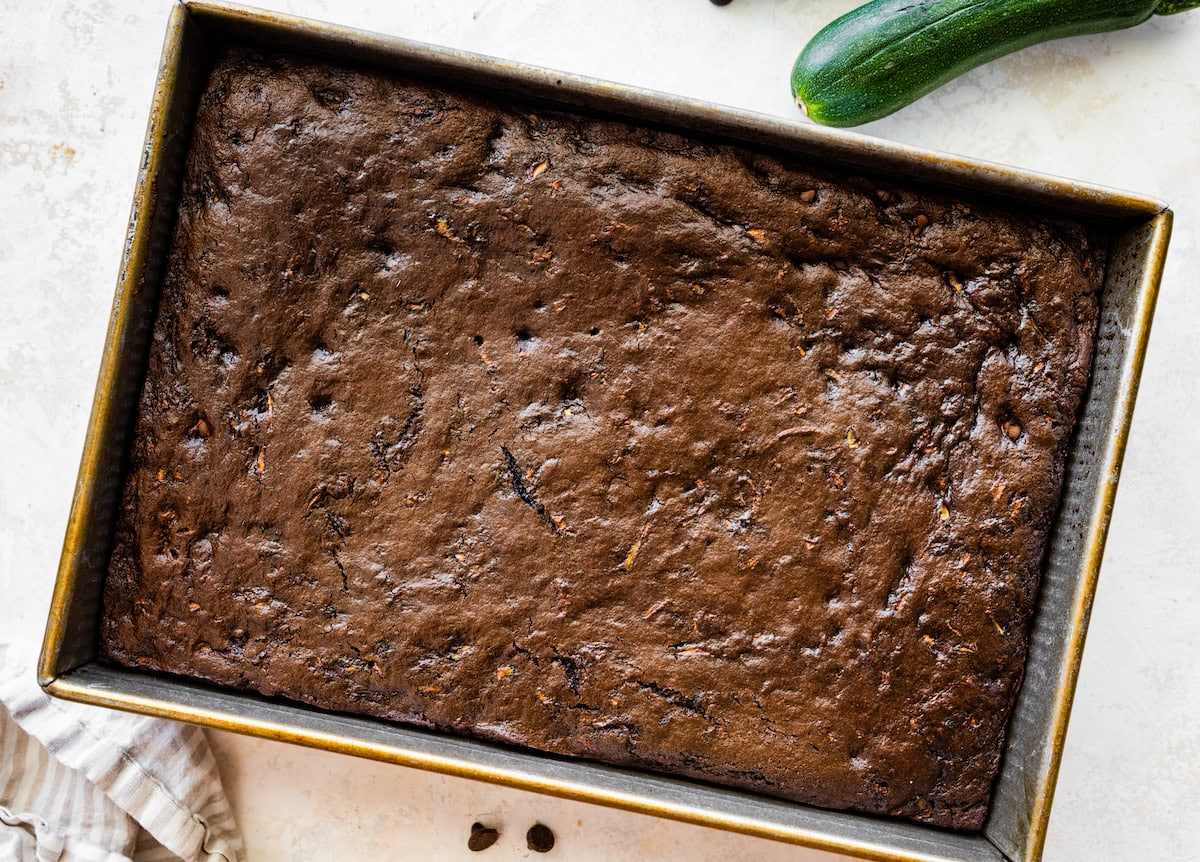 chocolate zucchini cake cooling in pan. 