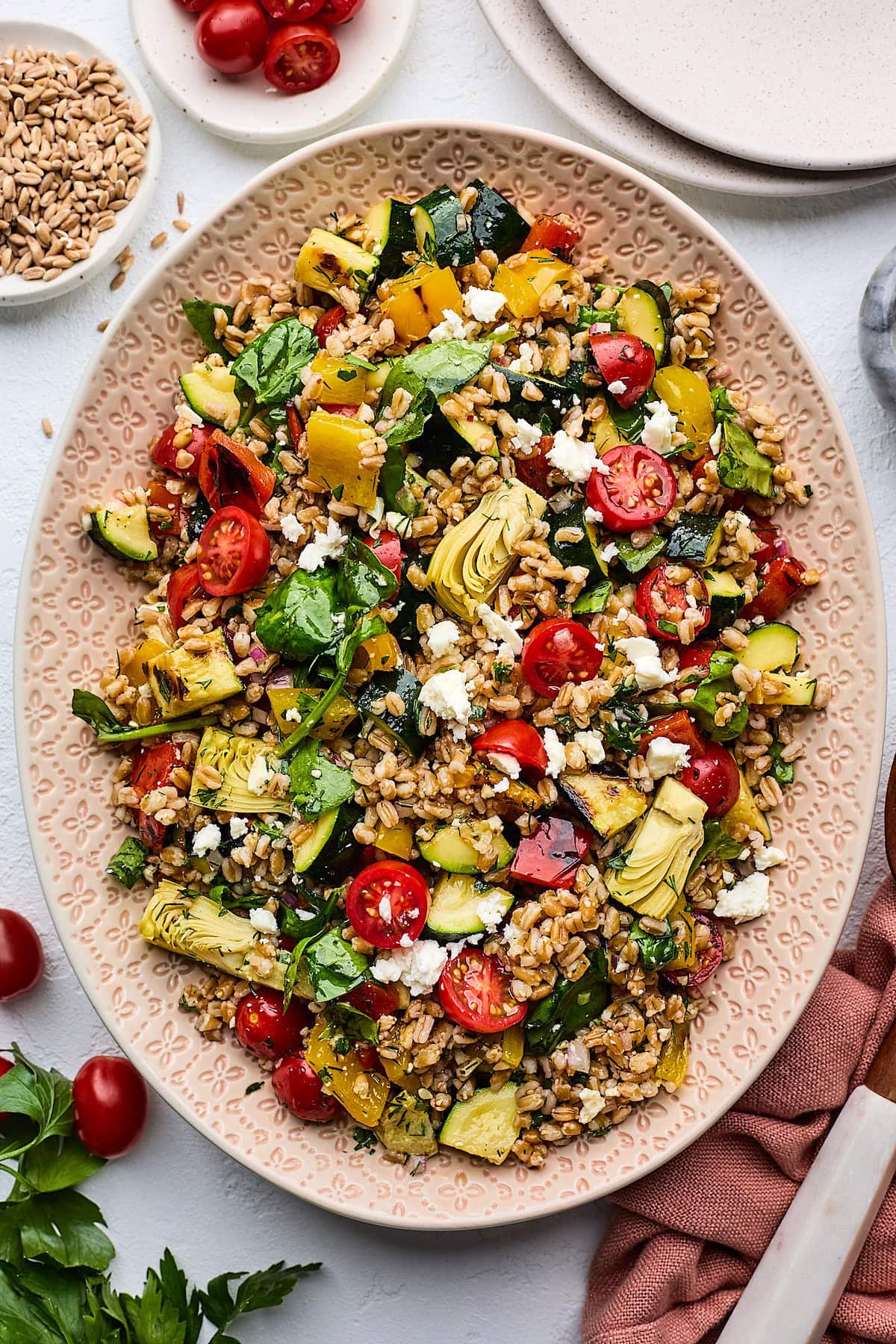 grilled vegetable farro salad on platter. 