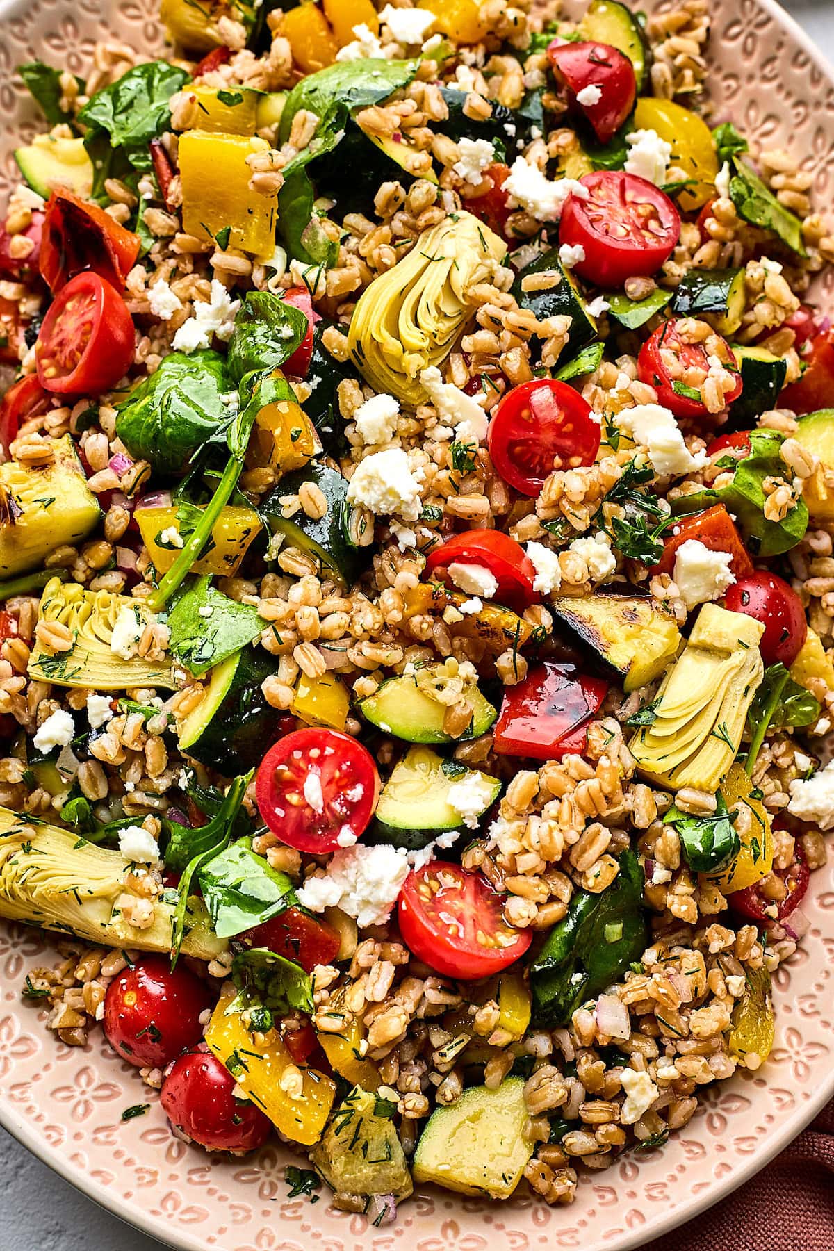 close up of grilled vegetable farro salad. 