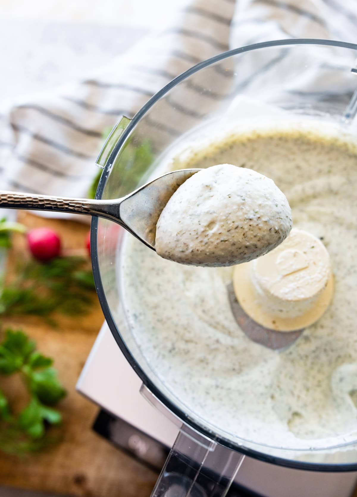 homemade ranch dip on spoon. 