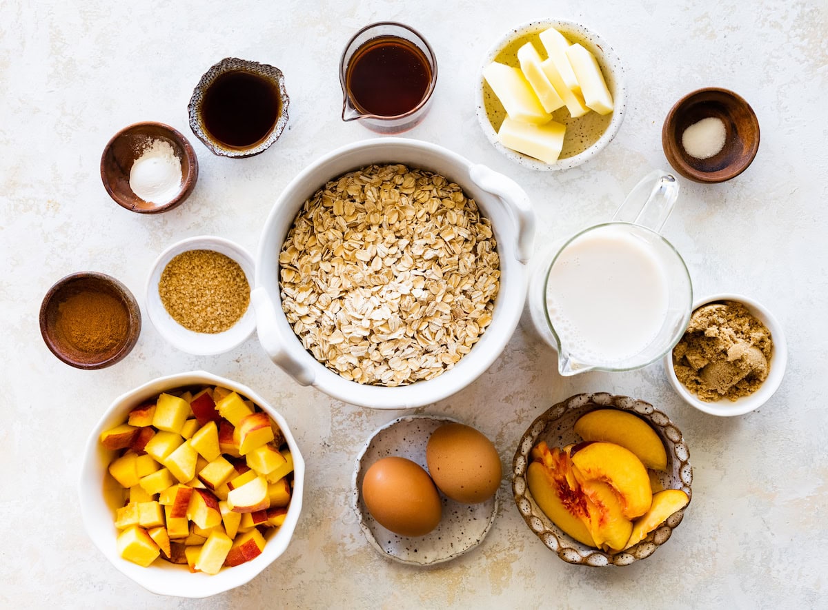 ingredients in bowls to make brown butter peach baked oatmeal. 