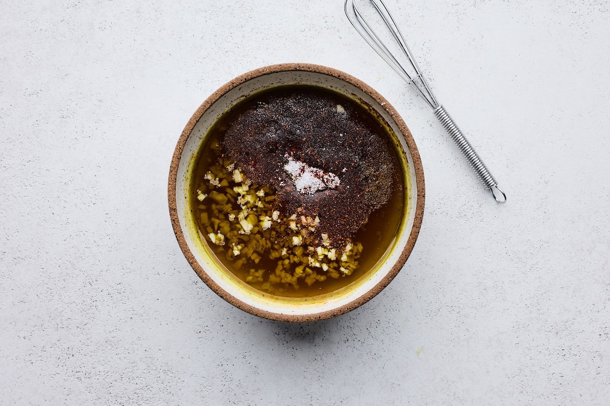 hot honey lemon garlic marinade in bowl to make hot honey chicken. 