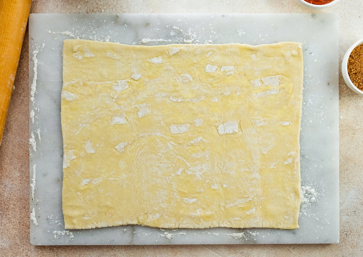 puff pastry sheet on marble board. 