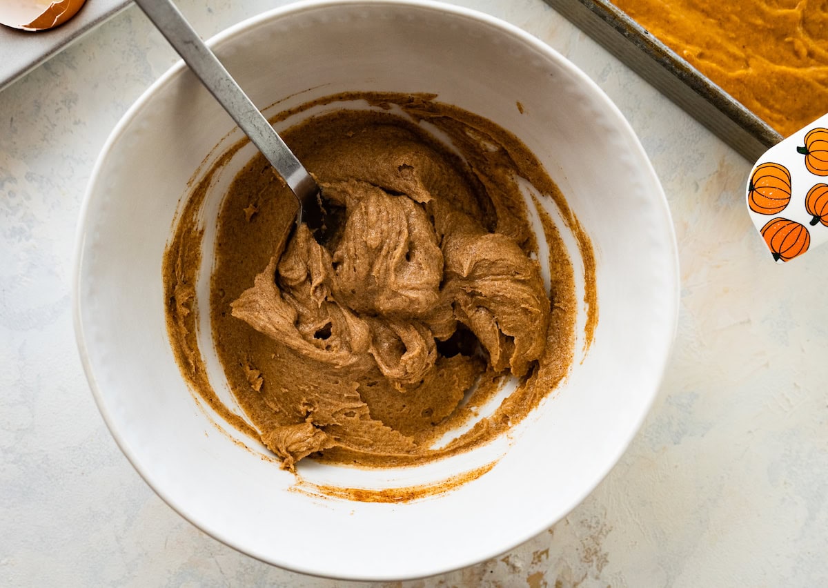 cinnamon swirl mixture in bowl with spoon. 