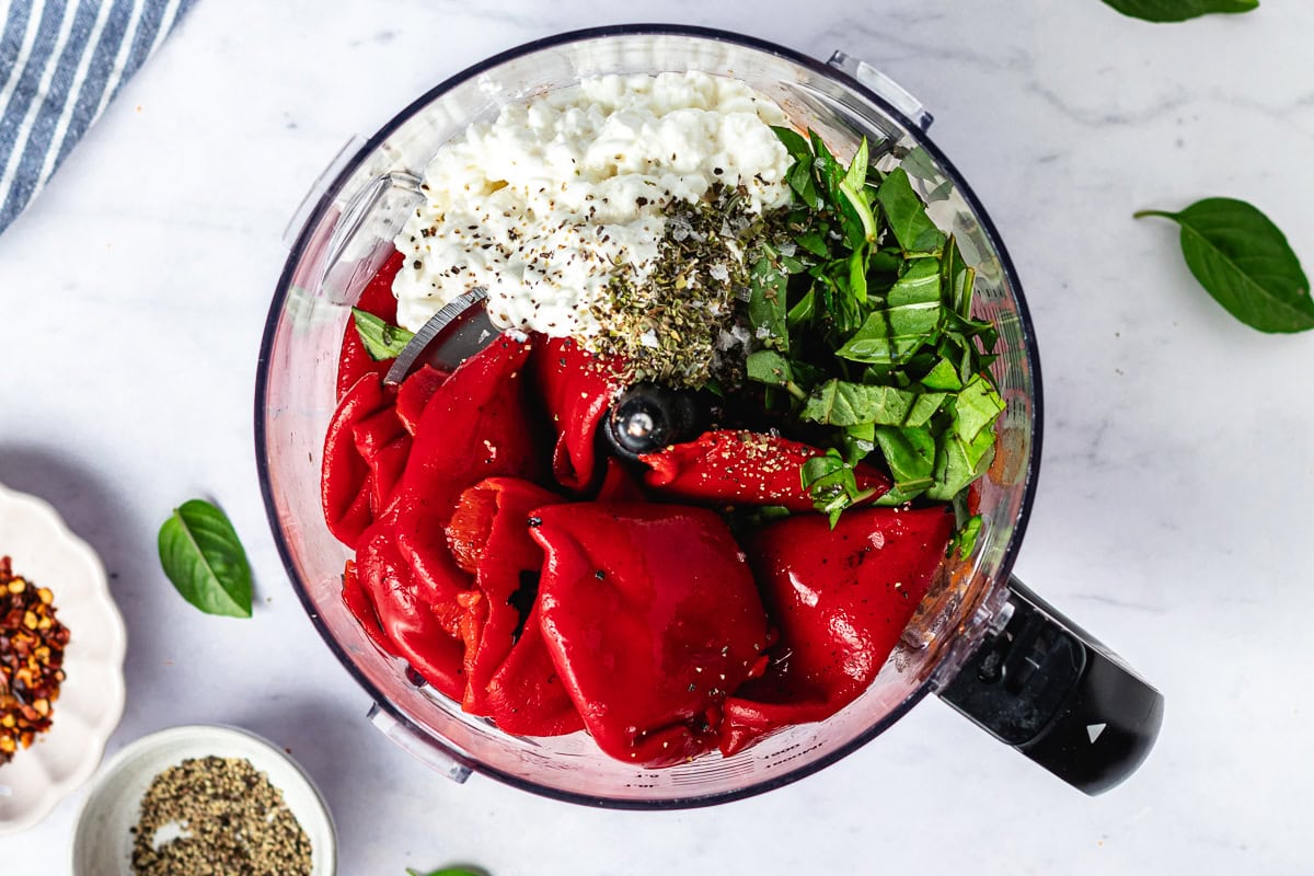 roasted red peppers, basil, herbs, cottage cheese, and tomatoes in food processor to make cottage cheese pasta sauce. 