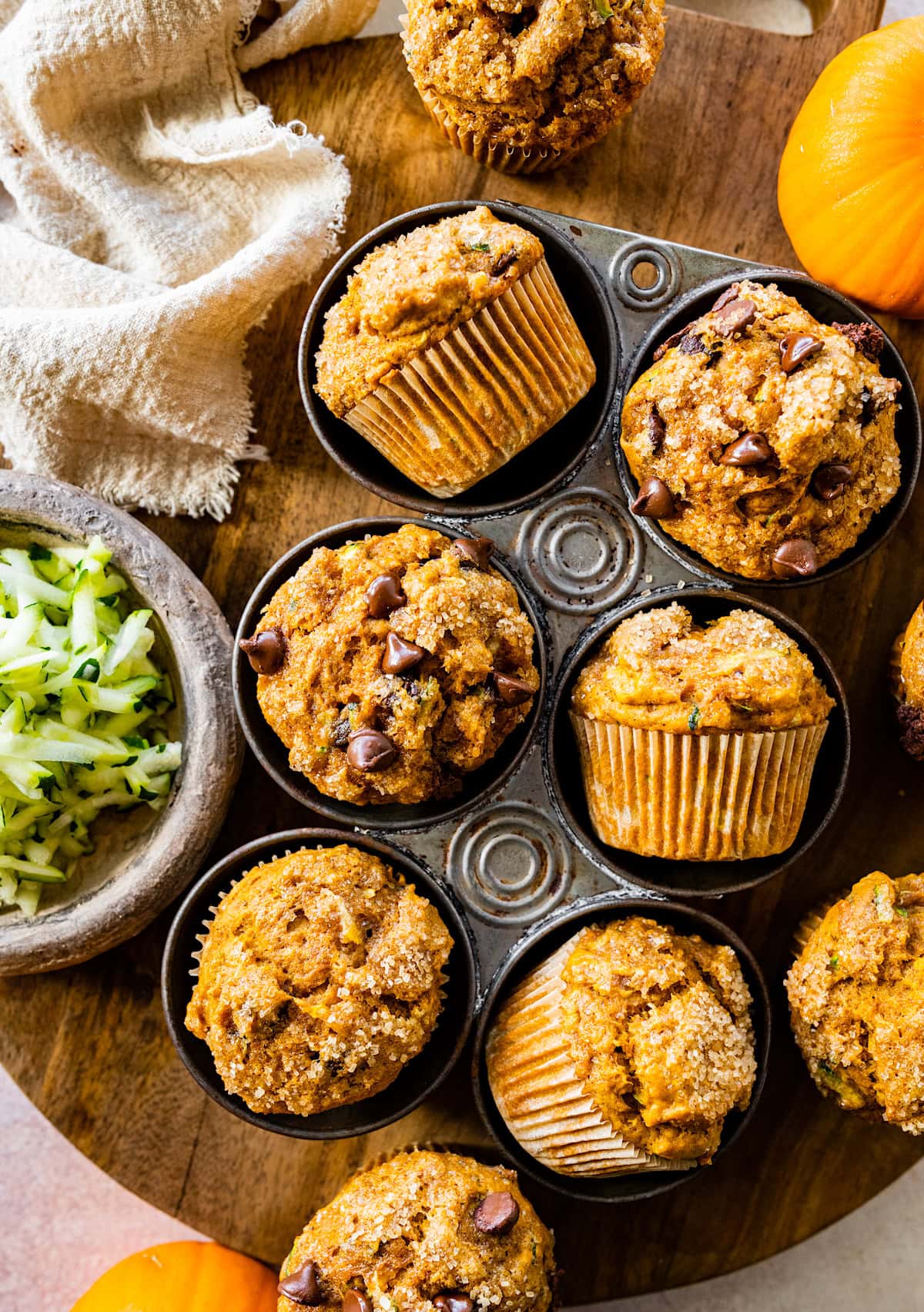 pumpkin zucchini muffins in muffin pan. 