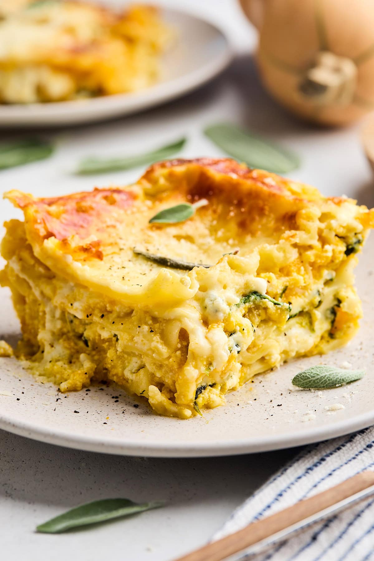 piece of butternut squash lasagna on plate. 