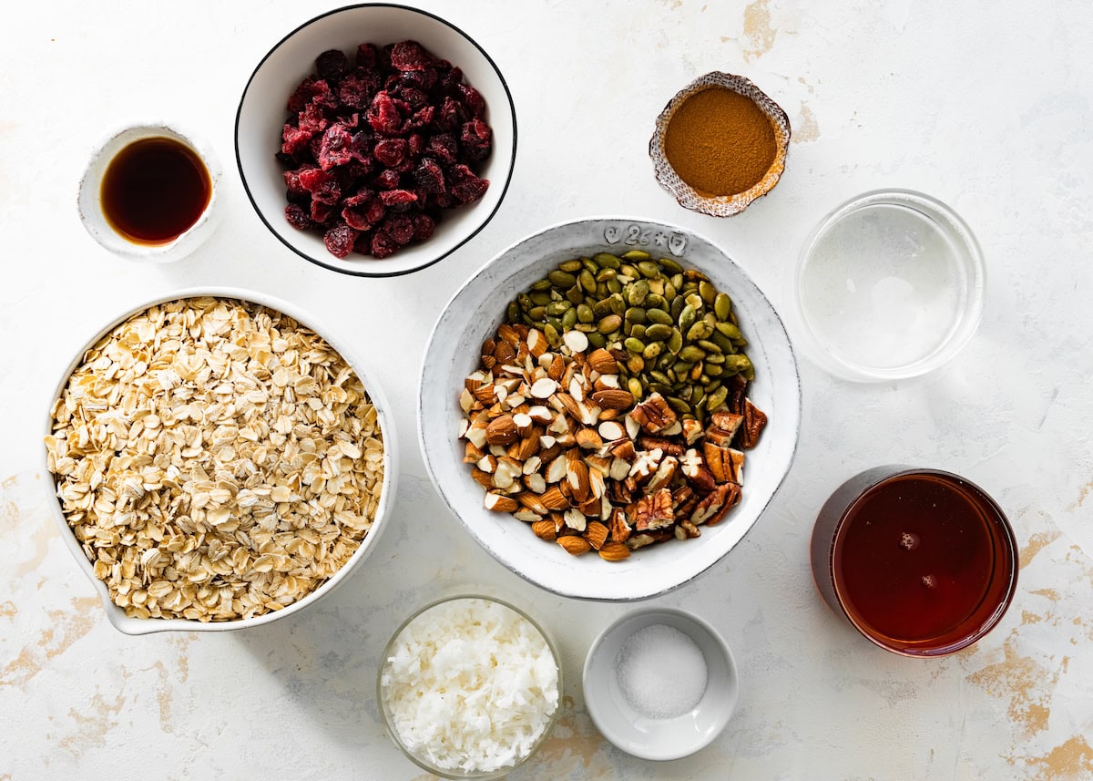 ingredients in bowls to make granola. 