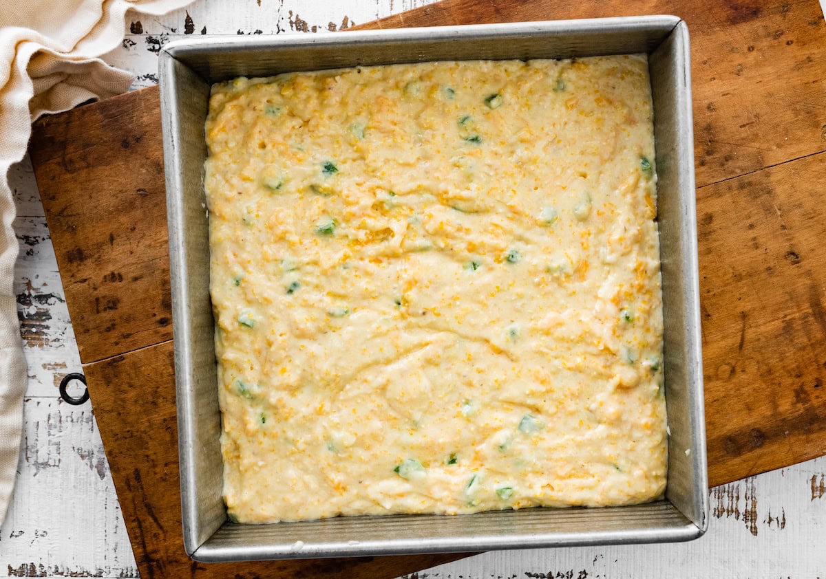 jalapeño cornbread batter in baking pan. 