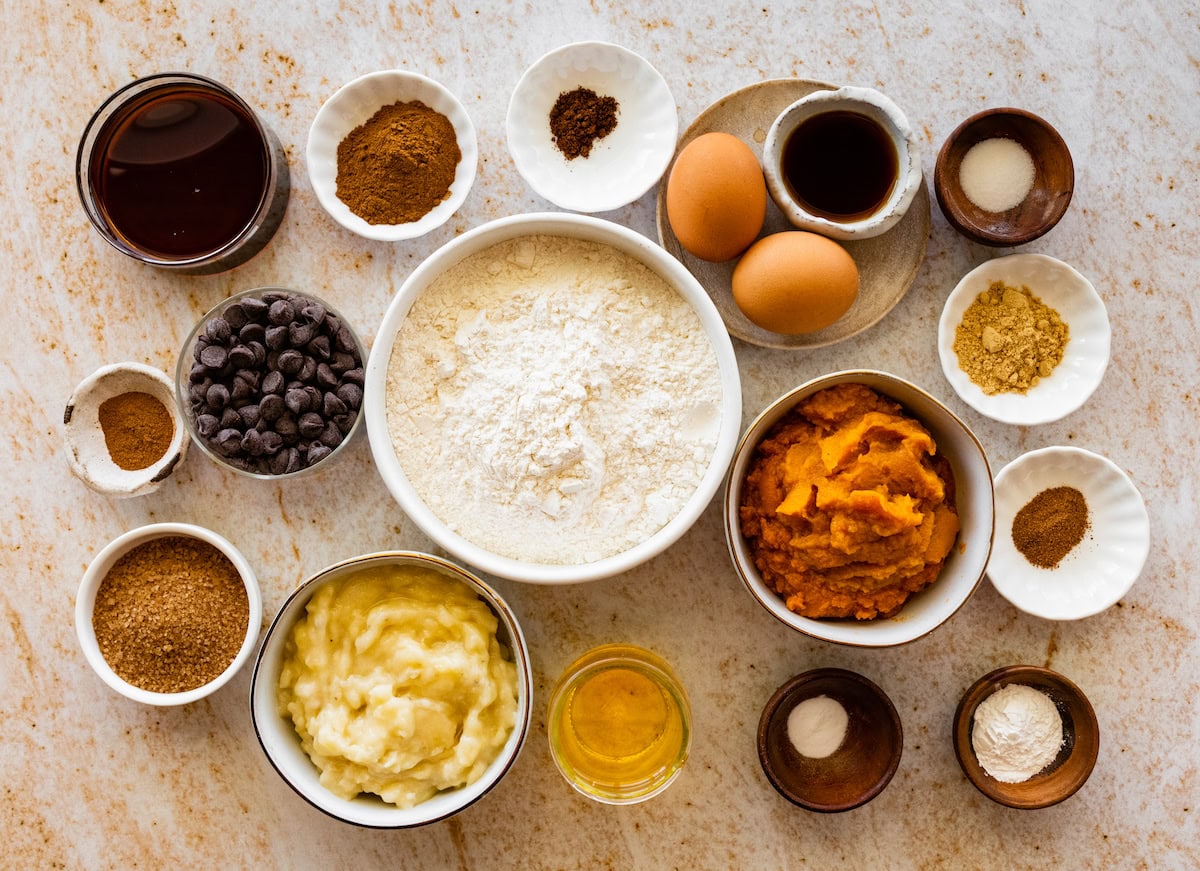 ingredients in bowls to make pumpkin banana muffins. 