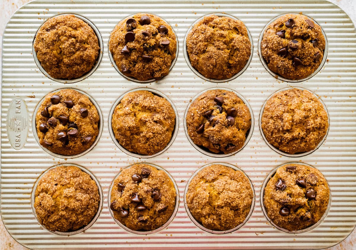 pumpkin banana muffins in muffin pan. 