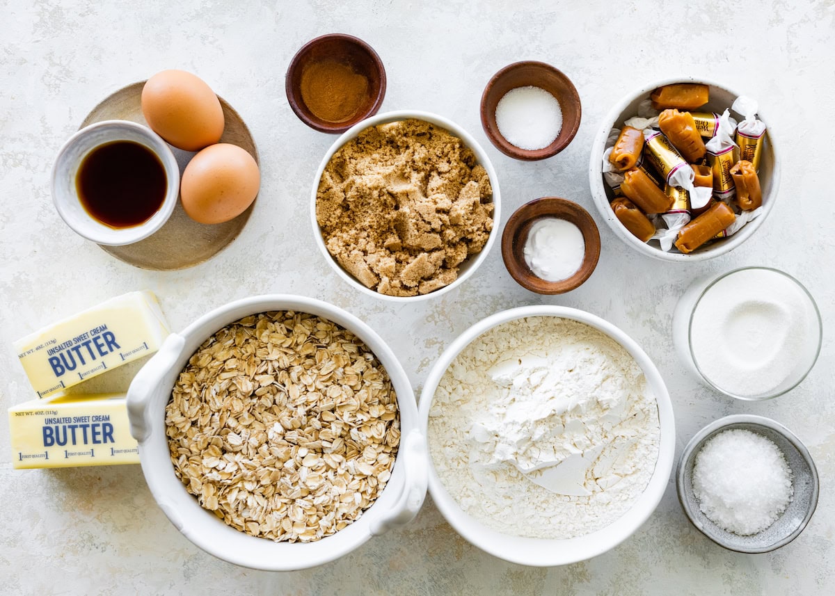 ingredients in bowls to make brown butter caramel oatmeal cookies. 