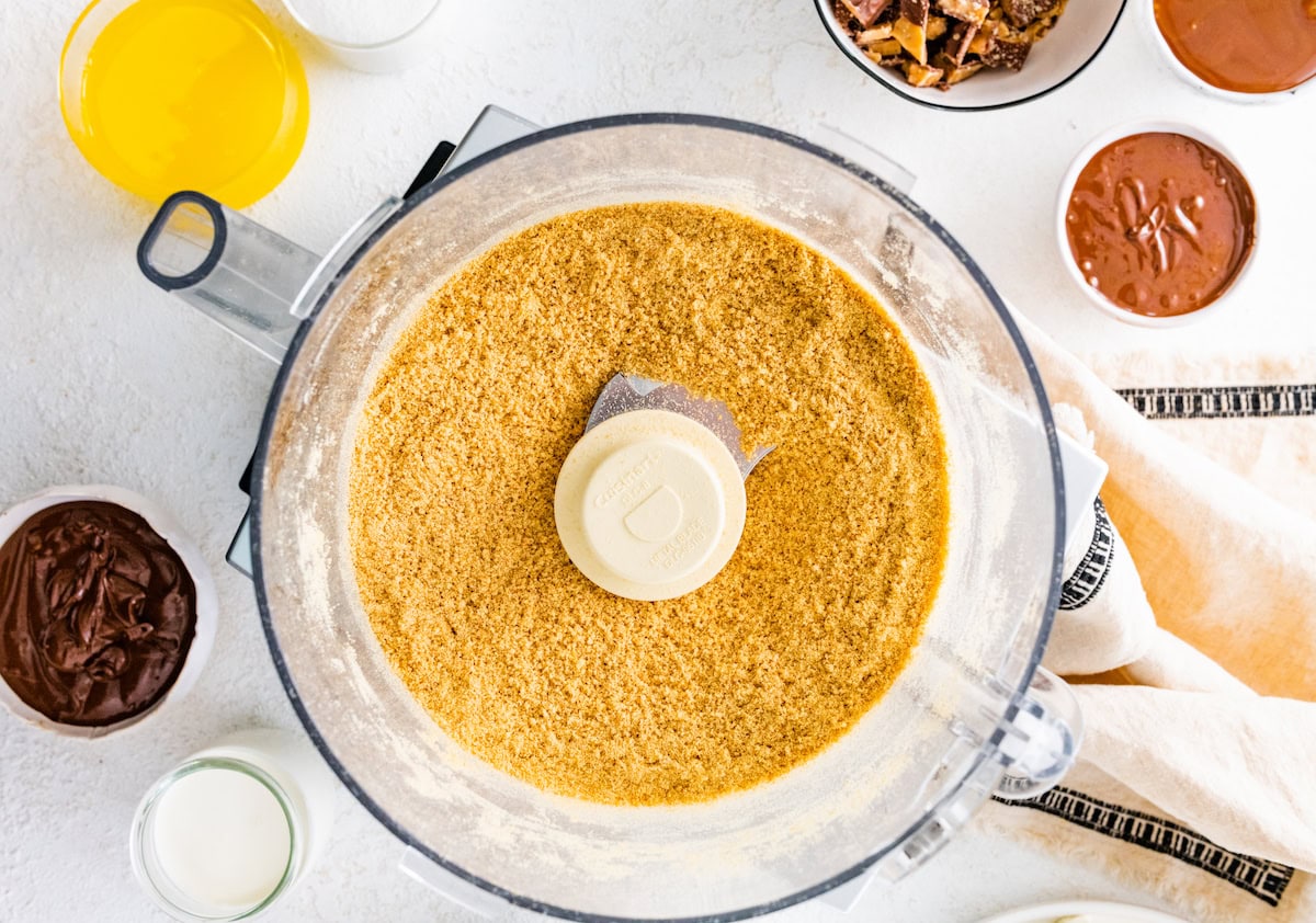 graham cracker crumbs in food processor. 