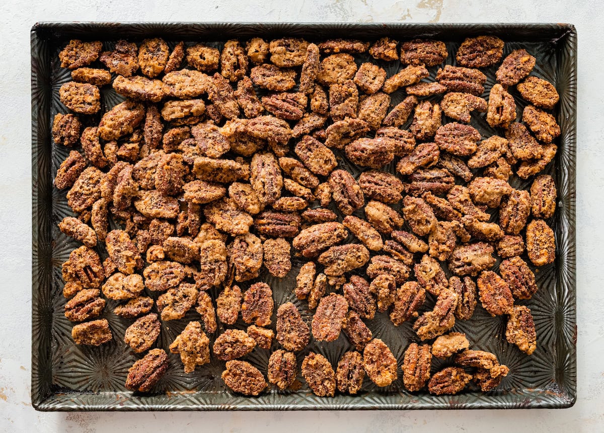 candied pecans on baking sheet. 