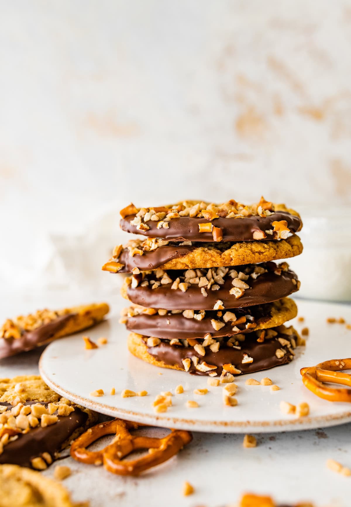 stack of chocolate dipped pretzel cookies. 