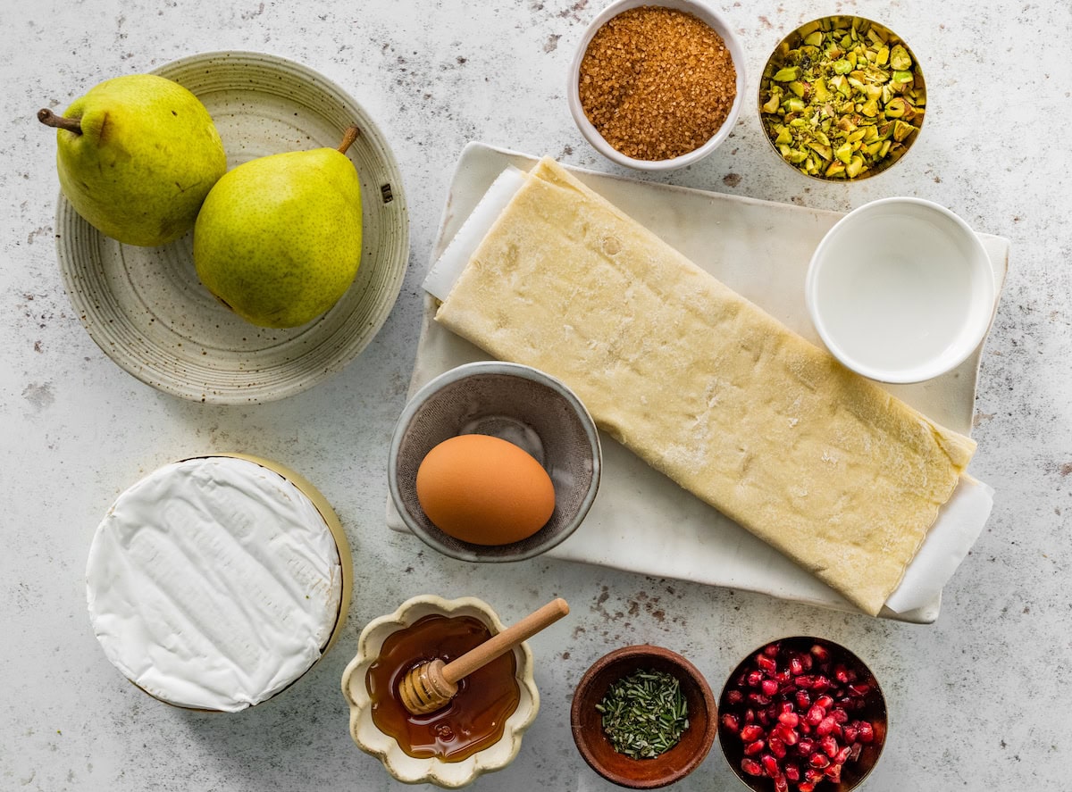 ingredients to make pear brie puff pastry tart. 