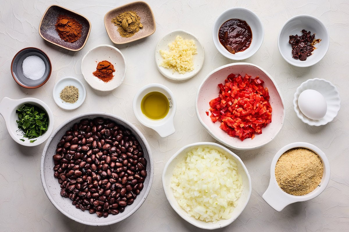 ingredients in bowls to make black bean burger. 