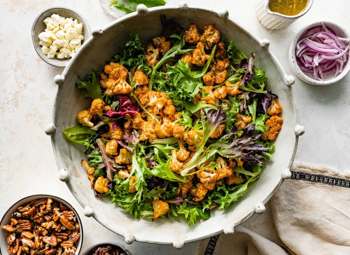 roasted cauliflower salad in serving bowl. 