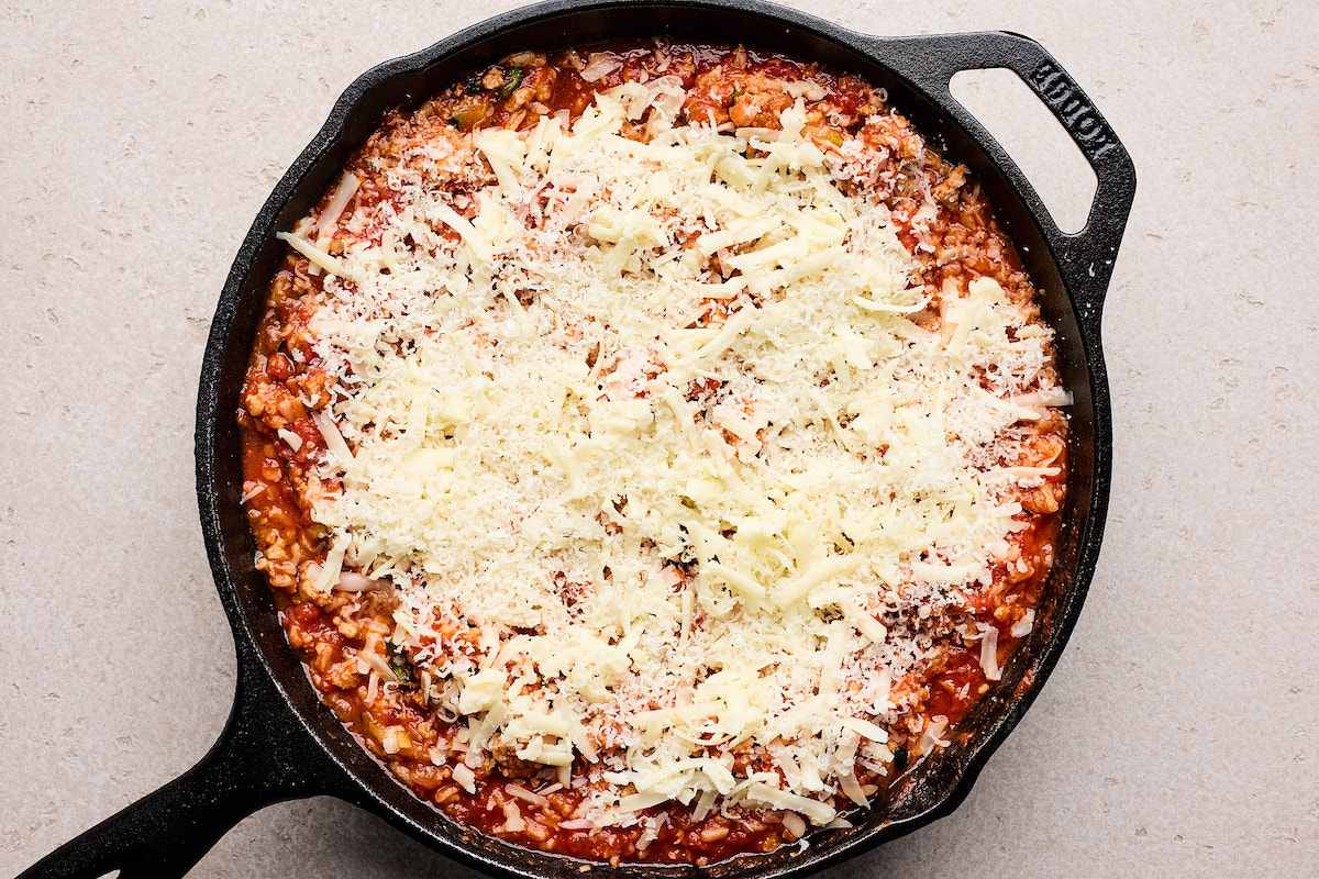 shredded mozzarella sprinkled over turkey rice skillet with marinara sauce. 