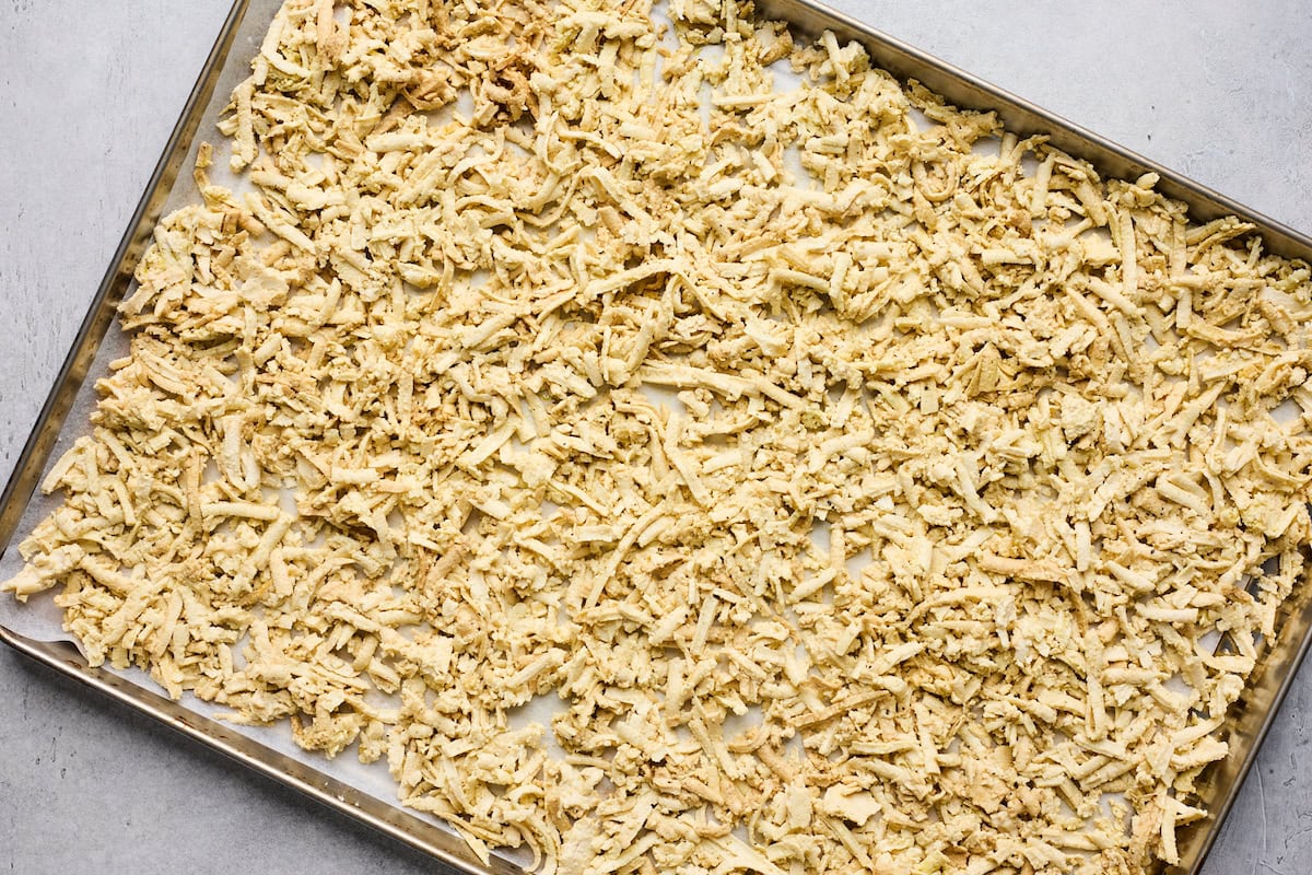 seasoned shredded tofu on baking sheet. 