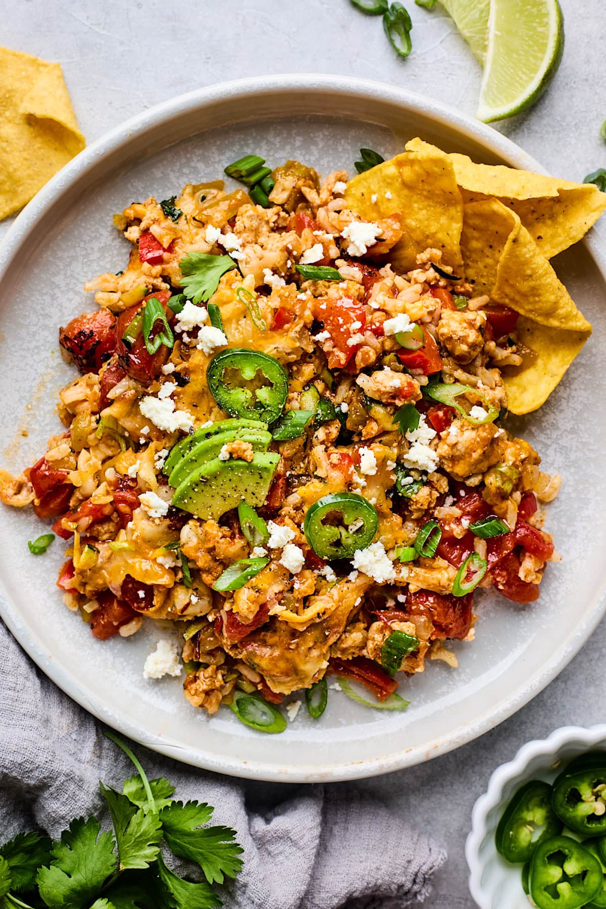 taco skillet on plate with tortilla chips. 