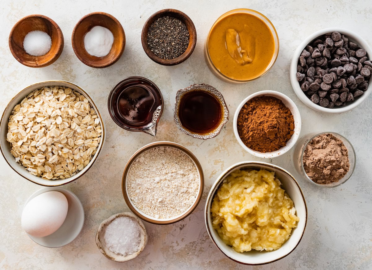 ingredients in bowls to make healthy chocolate cookies. 