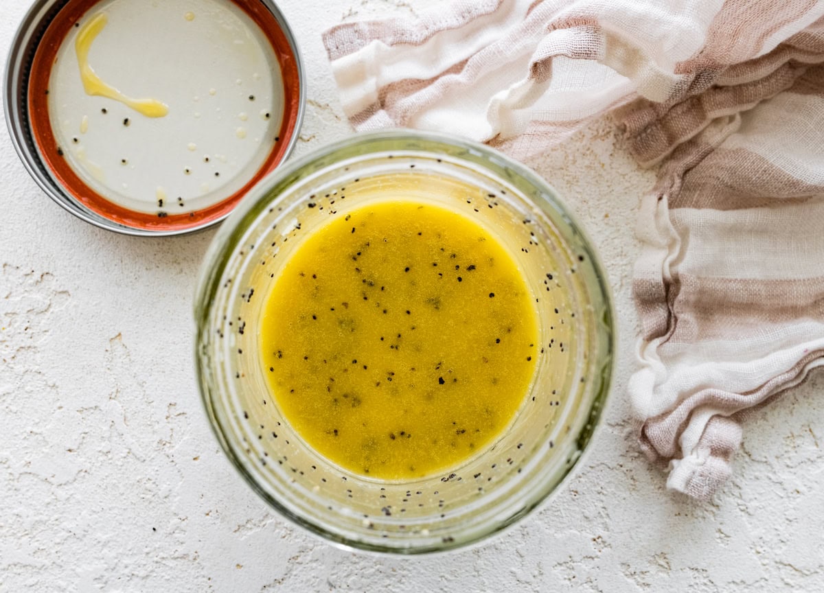 citrus poppy seed dressing in jar. 