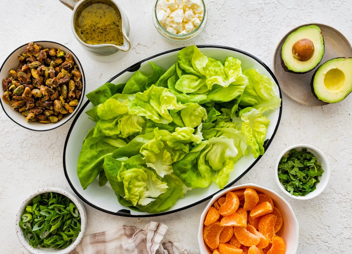 ingredients to make mandarin orange salad in bowls. 